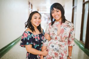 Female couple holding each other