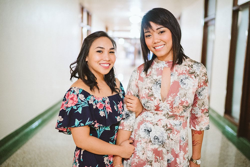 Female couple holding each other