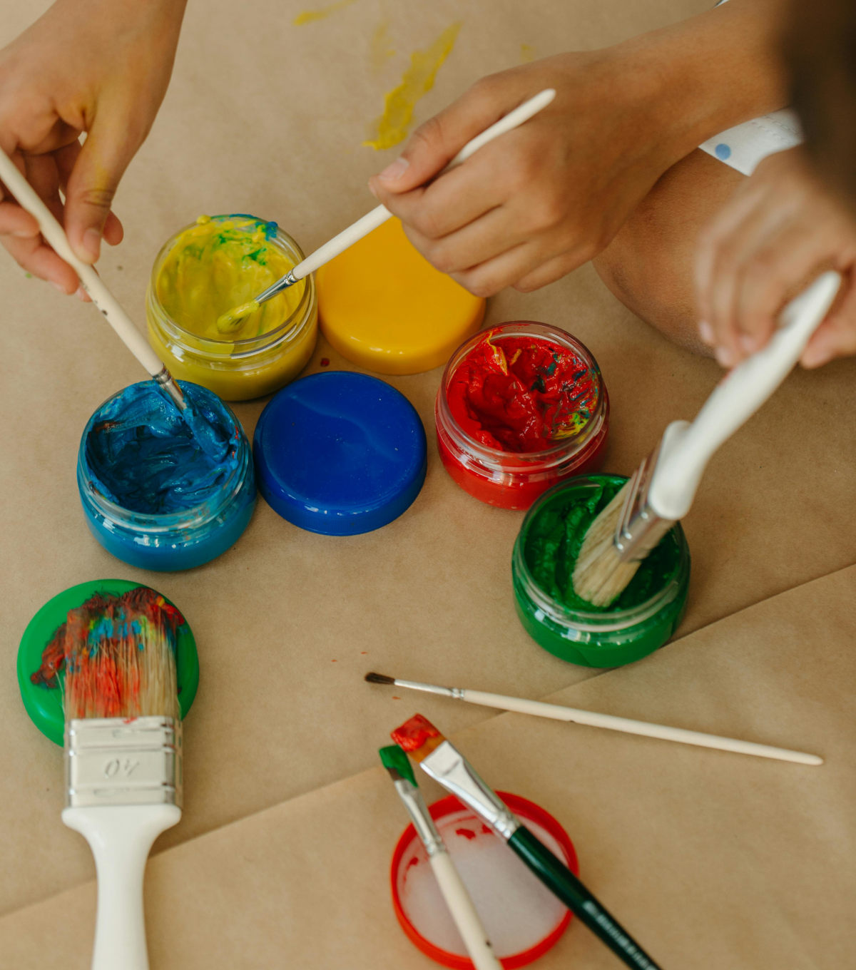 Paint brushes with colourful paint